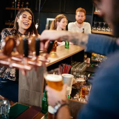 Woman ordering at bar